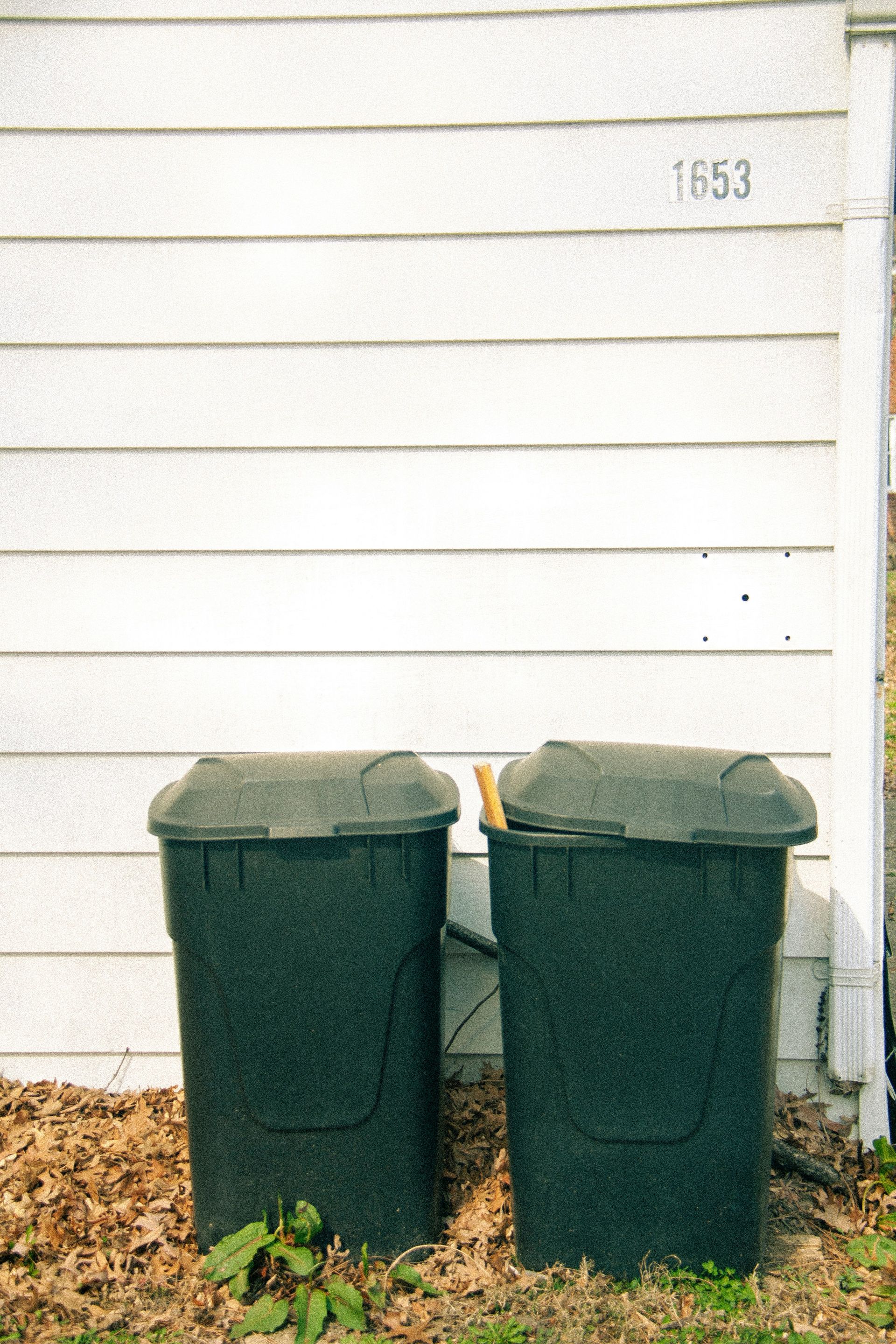 a group of garbage cans